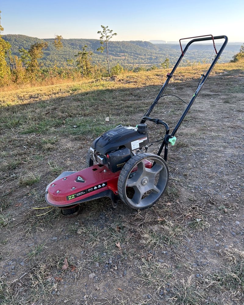 Our walk-behind string mower with a 22-inch cutting path